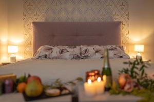 A bed or beds in a room at San Michele al Castello