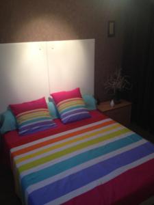 Postel nebo postele na pokoji v ubytování Chambre d'hôtes l'Amaryllis