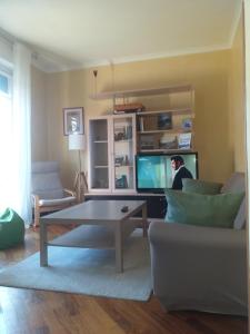 TV a/nebo společenská místnost v ubytování Casa Patrone appartamento Luigi
