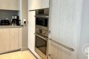 a kitchen with an oven in a kitchen at Luxury apartment with endless ocean views -Daily resort fee and parking not included- in Hollywood