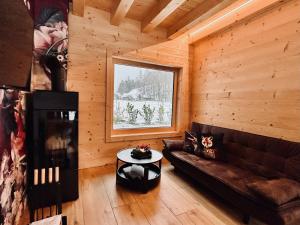 Posezení v ubytování Das Grünhaus - Dein Chalet in Grünau im Almtal