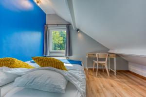 Postel nebo postele na pokoji v ubytování Au pied du sapin