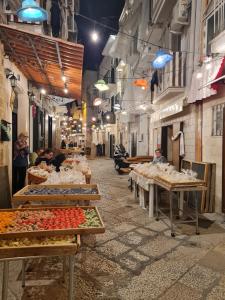 Restaurace v ubytování Casa Chloé - vicino al Porto e Basilica San Nicola