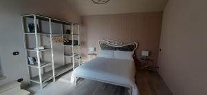 Postel nebo postele na pokoji v ubytování Casale Raffaello B&B Como