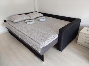 Postel nebo postele na pokoji v ubytování Apartman Aleksić u centru grada