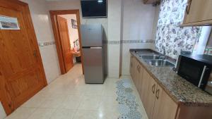 Kuchnia lub aneks kuchenny w obiekcie Rico Apartaments Ricosol