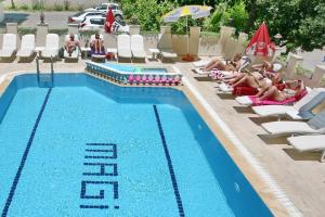 The swimming pool at or close to Magi Apart Hotel
