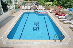 The swimming pool at or close to Magi Apart Hotel