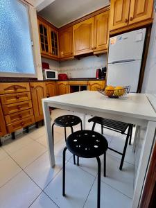 Kuchyň nebo kuchyňský kout v ubytování Apartament Estella