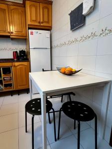 Kuchyň nebo kuchyňský kout v ubytování Apartament Estella