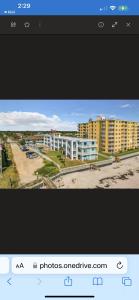 a screenshot of a picture of a city at Coastal Waters 209 in New Smyrna Beach
