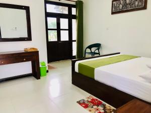 Postel nebo postele na pokoji v ubytování Aura Villa