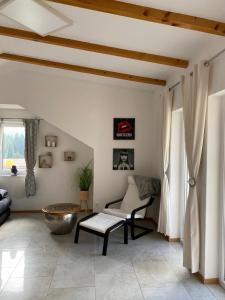 a living room with a couch and a table at Appartement Gamlitz in Gamlitz