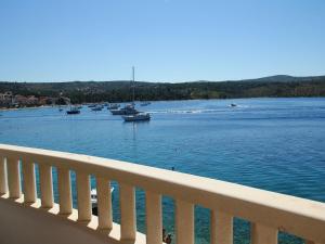 a view of a large body of water with boats at Holiday Home Blaž in Primošten