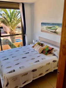 Tempat tidur dalam kamar di Villa Costa Antigua Piscina