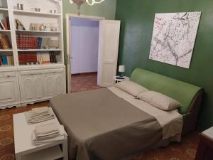 Postel nebo postele na pokoji v ubytování La casetta colorata + 5 fotografií