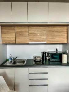 Küche/Küchenzeile in der Unterkunft Apartment by Park Biznesowy