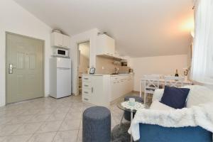 Kuchyň nebo kuchyňský kout v ubytování Apartment Mladen 1860