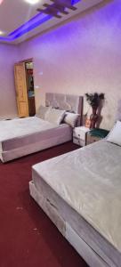 Cama ou camas em um quarto em Riad Khadija: Relax & Explore