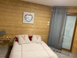 Postel nebo postele na pokoji v ubytování Chambre de la Tournette