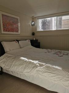 מיטה או מיטות בחדר ב-John's House in Vancouver West