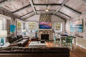 a living room with a couch and a table at The Inn on Siesta Key in Siesta Key