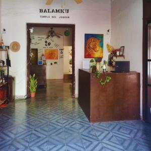 a lobby with a reception desk in a building at Balamku Hotel Petit in Campeche