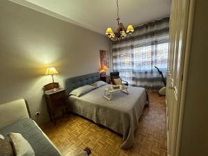 Posteľ alebo postele v izbe v ubytovaní A casa da mamma