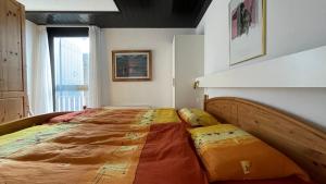 Voodi või voodid majutusasutuse Bel appartement de 2 chambres avec magnifique vue à Crans-Montana toas