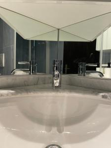 Vannituba majutusasutuses Bel appartement de 2 chambres avec magnifique vue à Crans-Montana +32 fotot