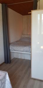 Postelja oz. postelje v sobi nastanitve Appartement plan d'eau vue panoramique