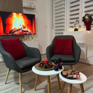 Posezení v ubytování R Lux Apartman Jagodina Akva Park + 37 fotografií