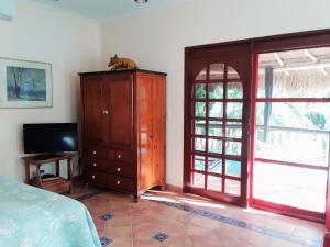 TV a/nebo společenská místnost v ubytování Casa Gatos Suites