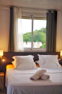 Voodi või voodid majutusasutuse Villa Sweet Caraïbes, vue mer, jacuzzi toas