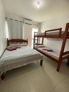 Postel nebo postele na pokoji v ubytování Excelente Bangalô/duplex em Jacumã - PB + 47 fotografií