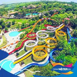an aerial view of a water park with a roller coaster at São Pedro Thermas Resort in São Pedro