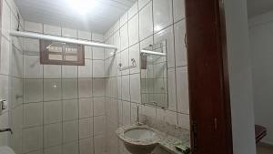 Ванна кімната в Pousada do Didi Chapada dos Guimaraes.