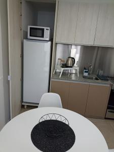 Kuchyň nebo kuchyňský kout v ubytování Cerrito 4+2 + 12 fotografií