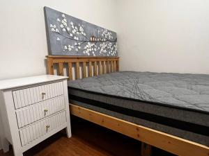 Ένα ή περισσότερα κρεβάτια σε δωμάτιο στο 3 Bedroom Cozy Stay 5km CBD