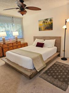 Ένα ή περισσότερα κρεβάτια σε δωμάτιο στο Cozy Condo in Kihei at Kamaole Sands Building 3 Unit 202 +17 φωτογραφίες