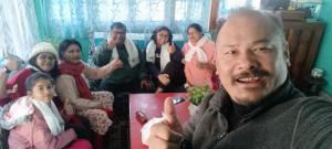 a group of people posing for a picture at Tharbaling HomeStay in Darjeeling