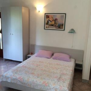 Llit o llits en una habitació de Apartment Kordić