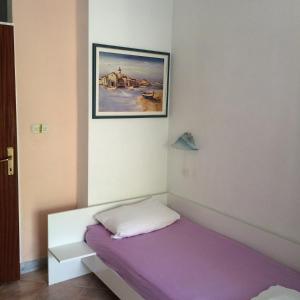 Llit o llits en una habitació de Apartment Kordić