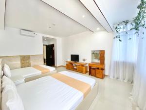 Giường trong phòng chung tại ZoZo House - Homestay Bai Sau