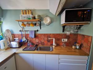 Billede fra billedgalleriet på Treehouse - Funky home - Terrasse sur le toit - Mezzanine - full appartment i Rouen