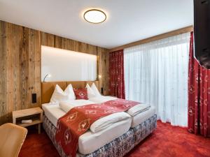 Posteľ alebo postele v izbe v ubytovaní Hotel Feichter