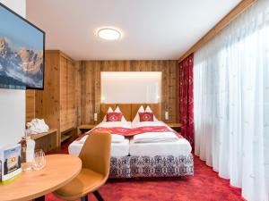 Posteľ alebo postele v izbe v ubytovaní Hotel Feichter
