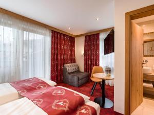 Posteľ alebo postele v izbe v ubytovaní Hotel Feichter