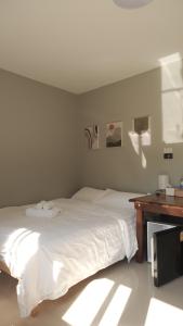 Ένα ή περισσότερα κρεβάτια σε δωμάτιο στο Namas Kan Farmstay
