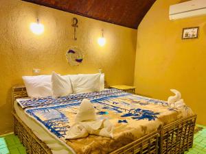 Postel nebo postele na pokoji v ubytování Kabara Nubian House + 37 fotografií